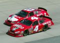 Martin Truex Jr., battles with Mike Wallace (No. 4) on his way to victory in the Stacker 2 Hundred NASCAR Busch Series event at Dover International Speedway.