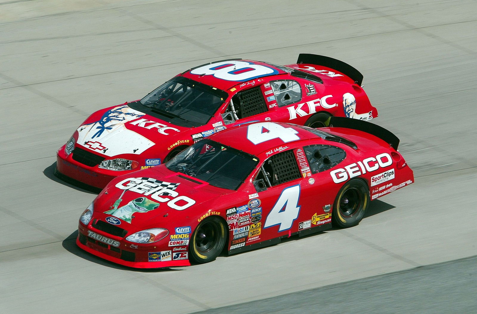 Martin Truex Jr., battles with Mike Wallace (No. 4) on his way to victory in the Stacker 2 Hundred NASCAR Busch Series event at Dover International Speedway.