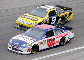 Dale Earnhardt Jr, driver of the #88 National Guard/Amp Energy Chevrolet, races Marcos Ambrose, driver of the #9 Stanley Ford, during the NASCAR Sprint Cup Series Kobalt Tools 400 at Las Vegas Motor Speedway in 2011.