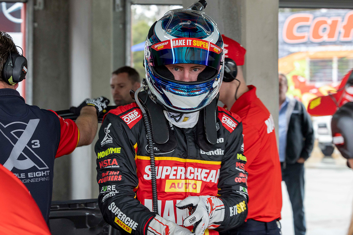 Declan Fraser in Triple Eight Supercheap Auto racesuit at Queensland Raceway test day in 2022