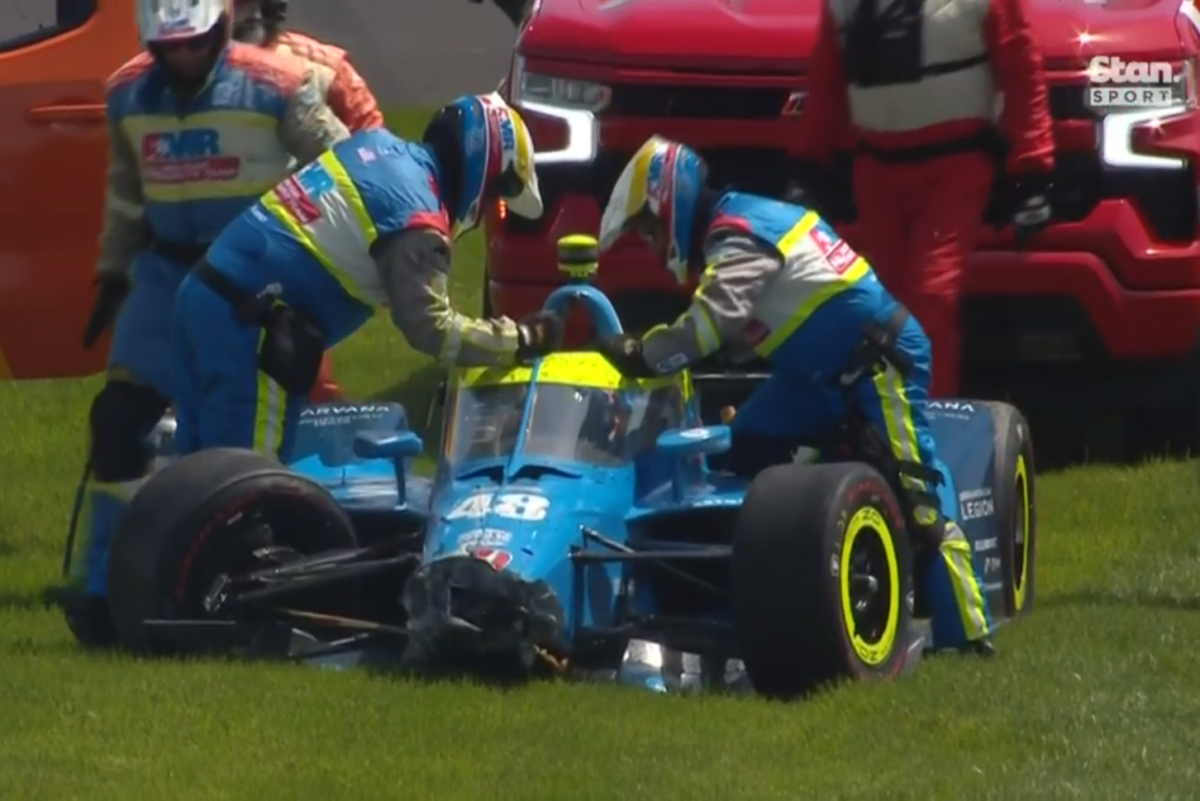 Indy 500 red flagged after Johnson crash