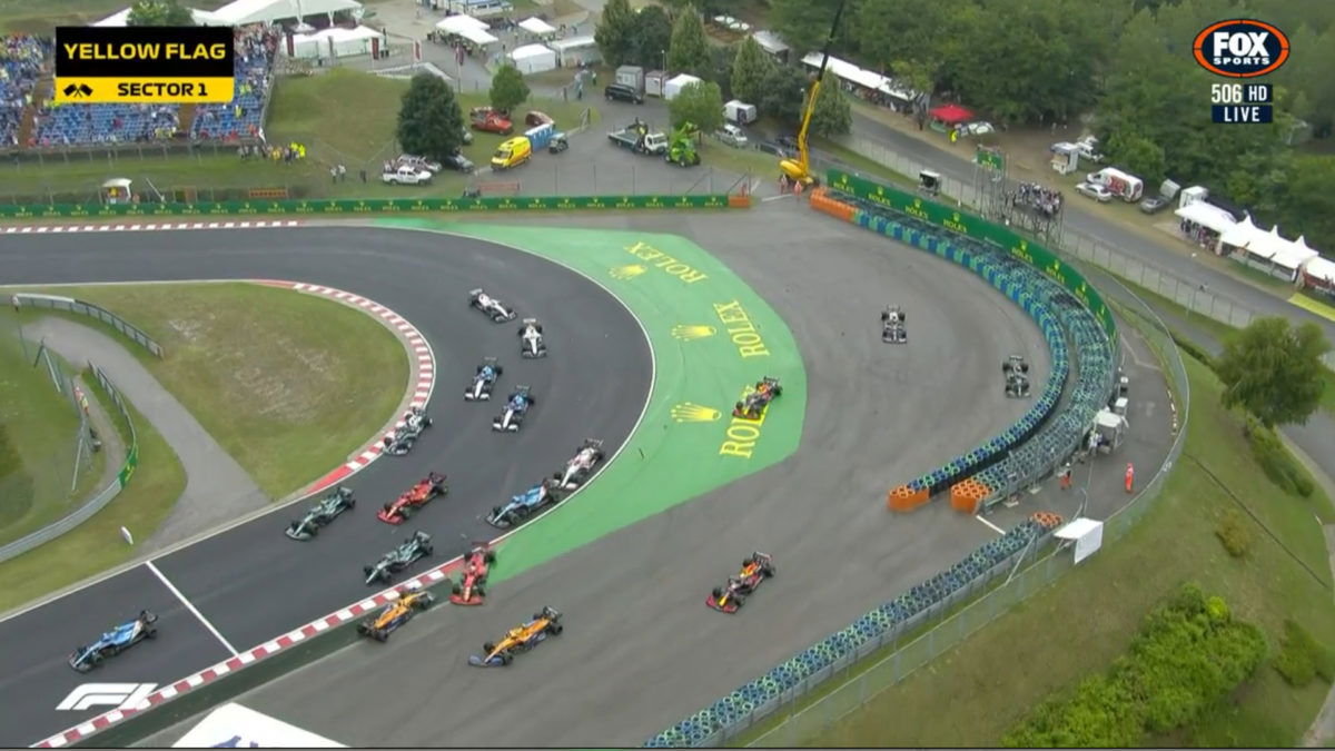 First corner carnage triggers F1 red flag