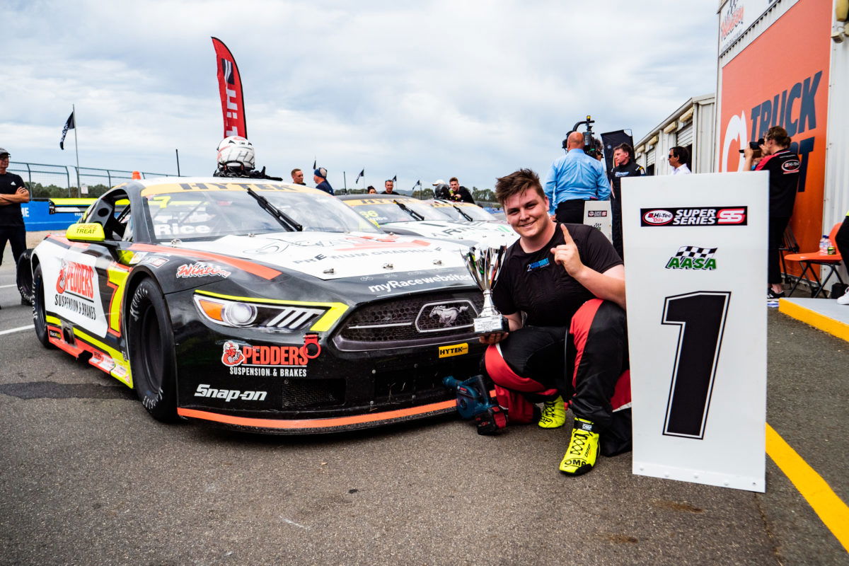 Jackson Rice celebrates winning in the TA2 Muscle Car Series.