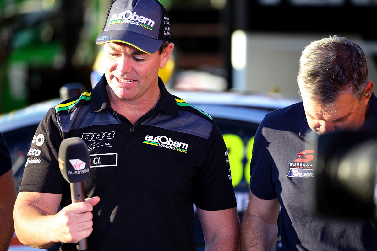 Craig Lowndes preparing for a television interview last year