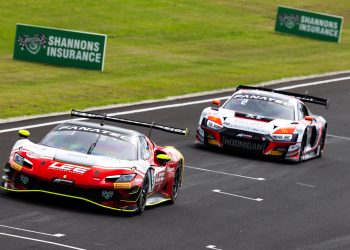 A Ferrari 296 GT3 leads an Audi R8 GT3 at Phillip Island.