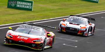 A Ferrari 296 GT3 leads an Audi R8 GT3 at Phillip Island.