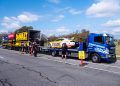 Reynolds' new Camaro being loaded for its trip to Ipswich.