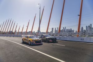 Anton De Pasquale and Cameron Waters drive their Supercars across the unopened Melbourne West Gate Tunnel Project.
