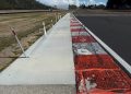 The Turn 9 exit kerb extension.