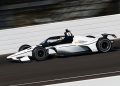 An IndyCar tests at Indianapolis Motor Speedway.