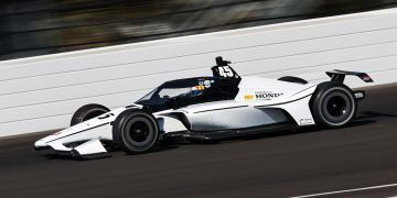 An IndyCar tests at Indianapolis Motor Speedway.