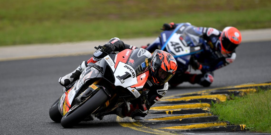 Josh Waters leads Mike Jones in race one. Image: Russell Colvin