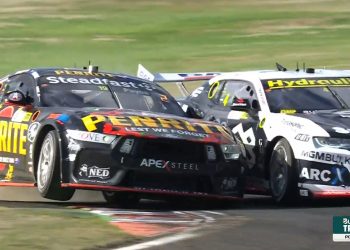 Matt Payne passes Cameron Hill for the lead during Race 10 of the Repco Supercars Championship at the Taupo Super440.