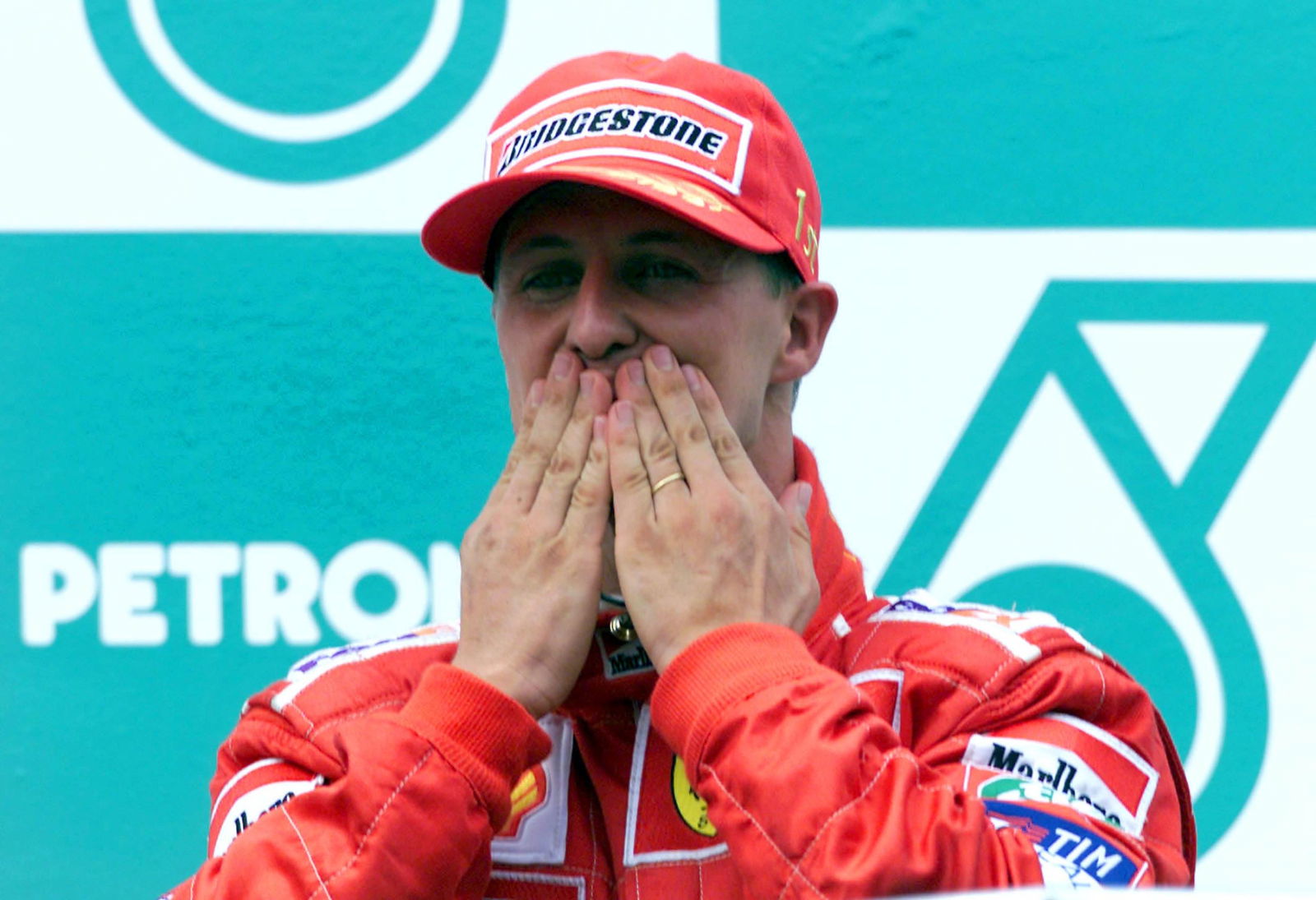 Michael Schumacher celebrates winning the 2000 Formula Malaysian Grand Prix at Sepang.