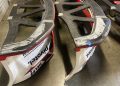 Skid blocks under the front bars of the DJR cars were deemed to have been modified.