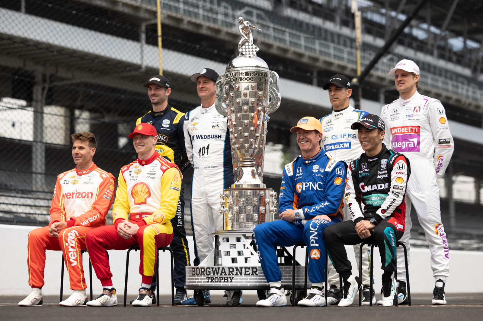 The eight previous winners of the Indianapolis 500 with the Borg-Warner Trophy.