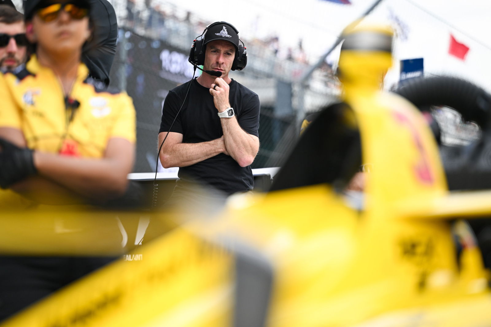 Simon Pagenaud looks over Scott McLaughlin's #3 Team Penske entry.