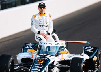 Pato O'Ward sits atop his Indy car as part of the front row shoot. Image: Joe Skibinski