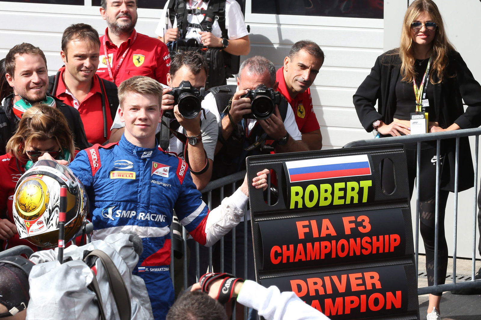 Robert Shwartzman celebrates winning the FIA Formula 3 Championship with Prema.