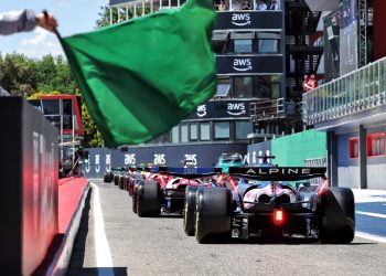 Formula 1 cars exit pit lane during Free Practice 1 at the 2025 Emilia-Romagna Grand Prix.