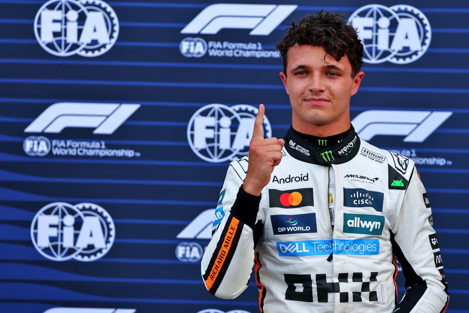 Norris snares Monaco pole with record lap