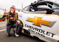 Alice Buckley celebrates winning Race 3 of the TA2 Muscle Car Series at Queensland Raceway. Image: Matthew Christie