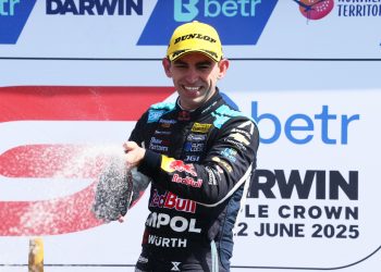 Broc Feeney celebrates on the podium at the Darwin Triple Crown.