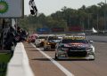 Broc Feeney greets the chequered flag first at Hidden Valley Raceway.