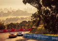 A pair of BMW M4 GT3 race cars head down Mount Panorama.