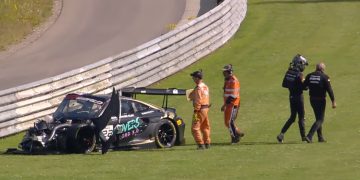 Laurin Heinrich walks away from the wrecked #22 Schumacher CLRT Porsche 911 GT3 R.