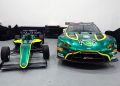 The Tatuus T-421 next to an Aston Martin Vantage GT3, both in Volante Rosso Motorsport colours.