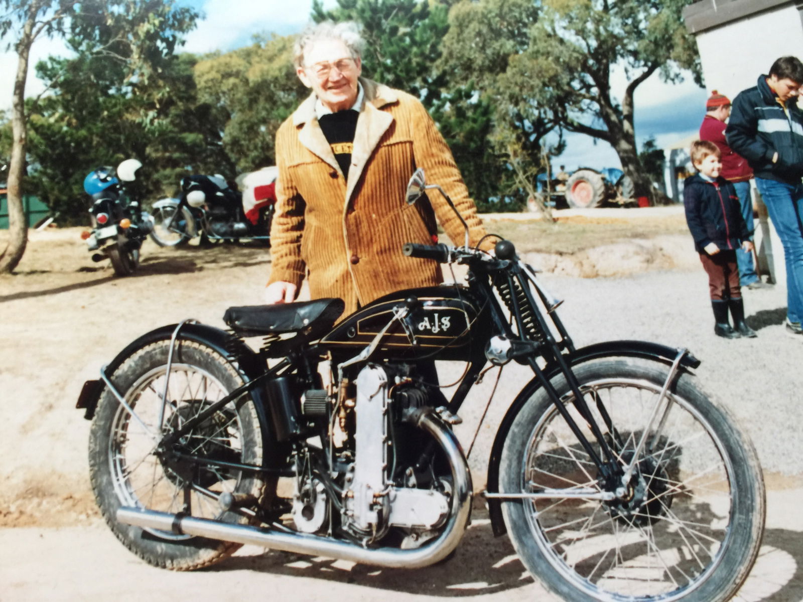 Australian motorcycle legend and Hall of Fame member Phil Irvine with the AJS motorcycle up for grabs.