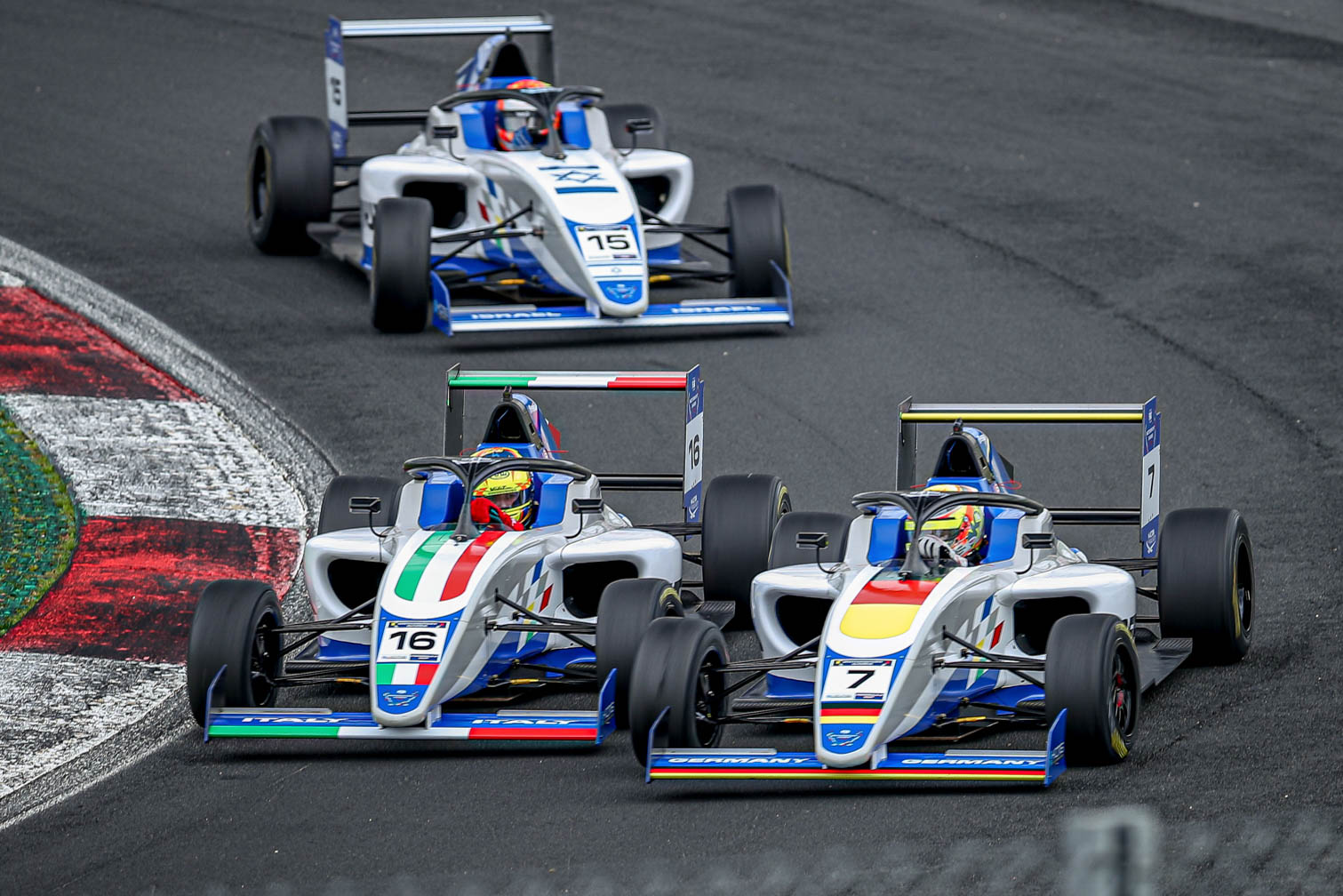 Formula 4 cars on track.