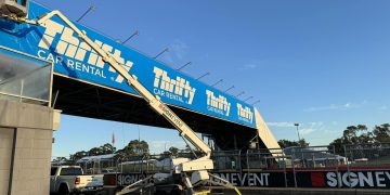 Signage changeover has started at Mount Panorama. Image: Sign Event