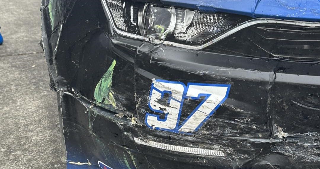 Shane van Gisbergen's #97 Camaro ended up worse for wear thanks to contact on restarts during his drive to victory at Portland. Image: Kaulig Racing Facebook