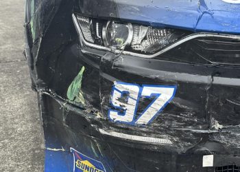 Shane van Gisbergen's #97 Camaro ended up worse for wear thanks to contact on restarts during his drive to victory at Portland. Image: Kaulig Racing Facebook