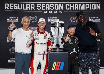 Tyler Reddick (second from right) celebrates winning the NASCAR Cup Series Regular Season Championship.