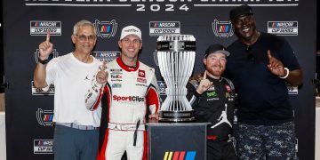 Tyler Reddick (second from right) celebrates winning the NASCAR Cup Series Regular Season Championship.