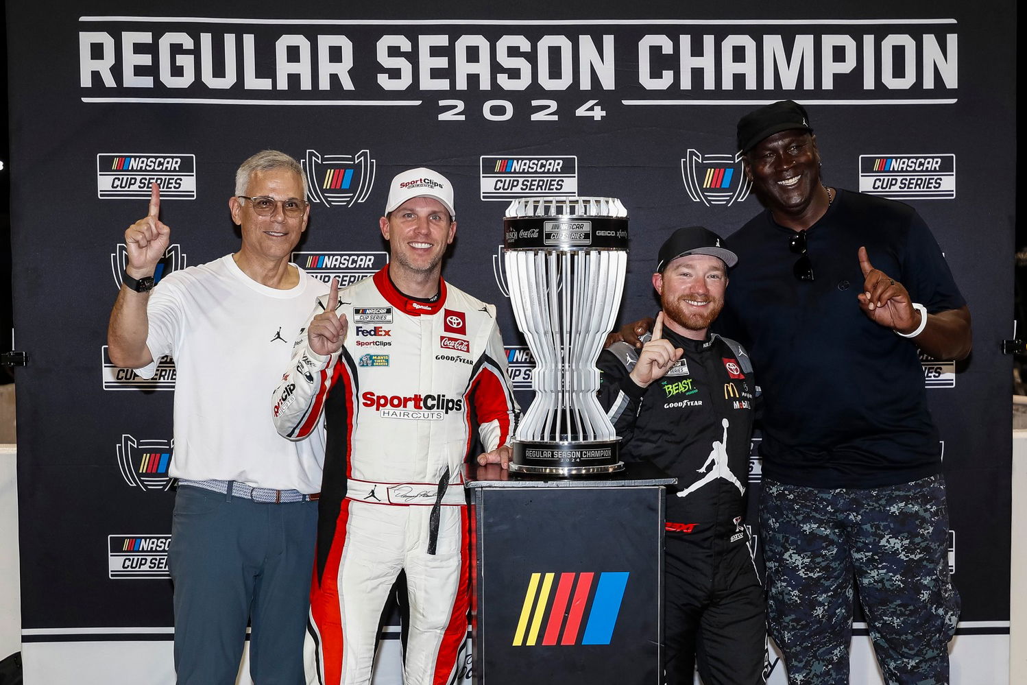 Tyler Reddick (second from right) celebrates winning the NASCAR Cup Series Regular Season Championship.