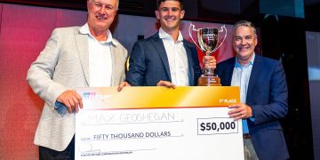 Geoghegan with Toyota's Sean Hanley and Neil Crompton, and his GR Cup prize.