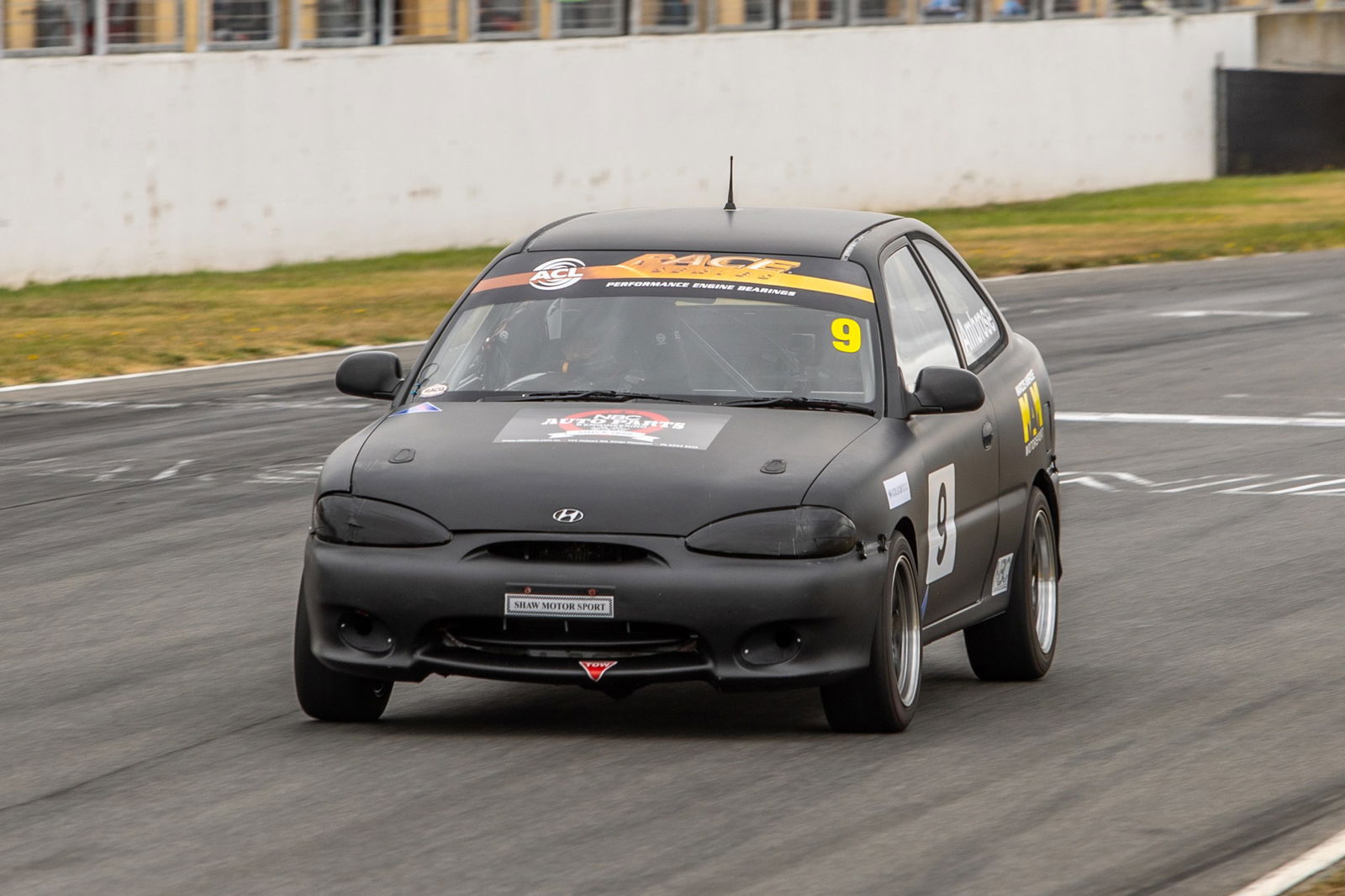 Tabitha Ambrose in her Hyundai Excel.