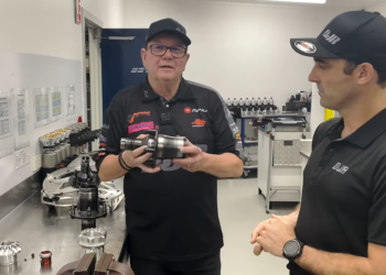 Brad Jones (centre, with BJR head of engineering Paul Scalzo) with a Gen3 spindle. Image: Brad Jones Racing