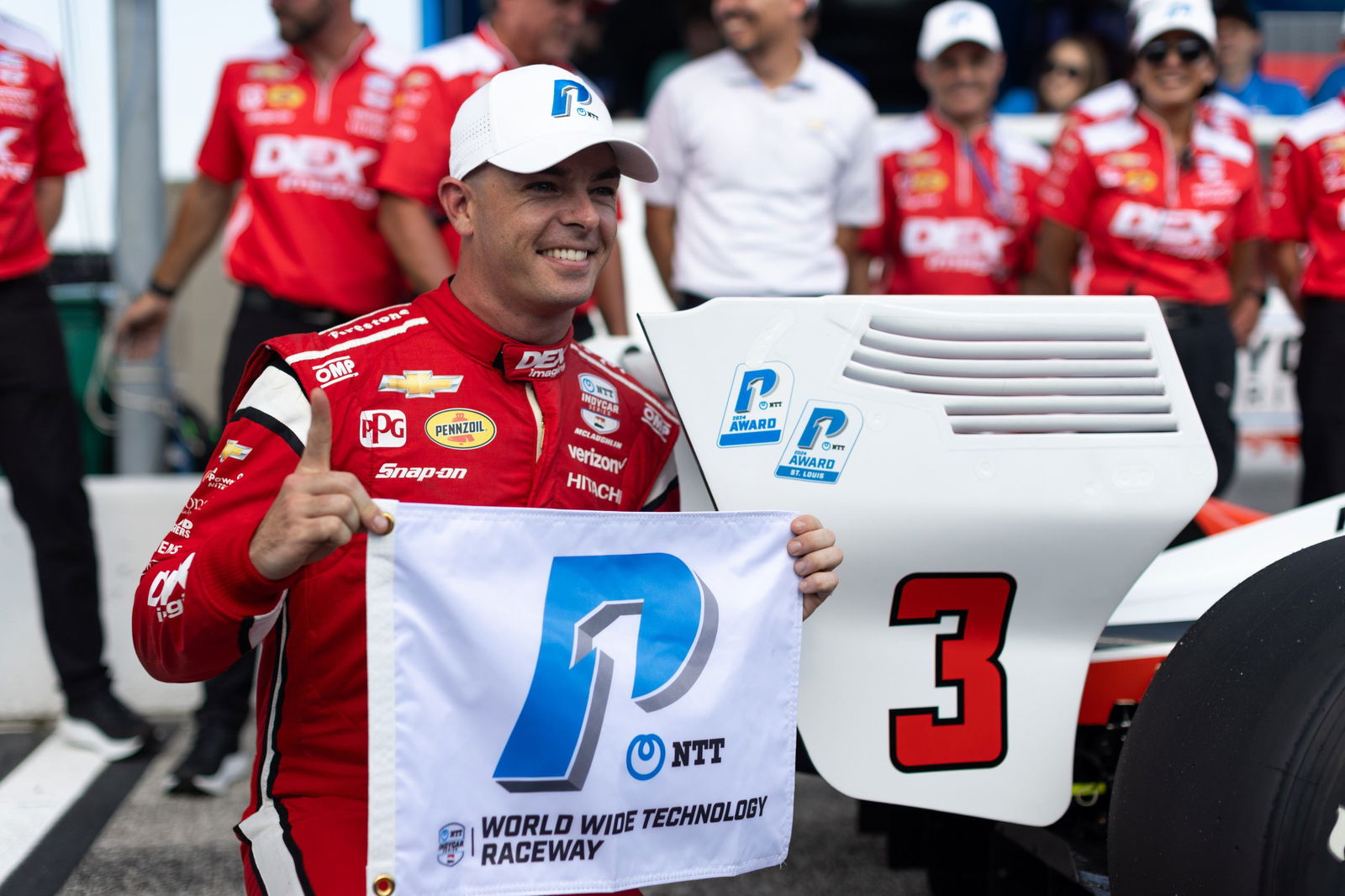 Scott McLaughlin celebrates his fourth IndyCar pole position of the season.