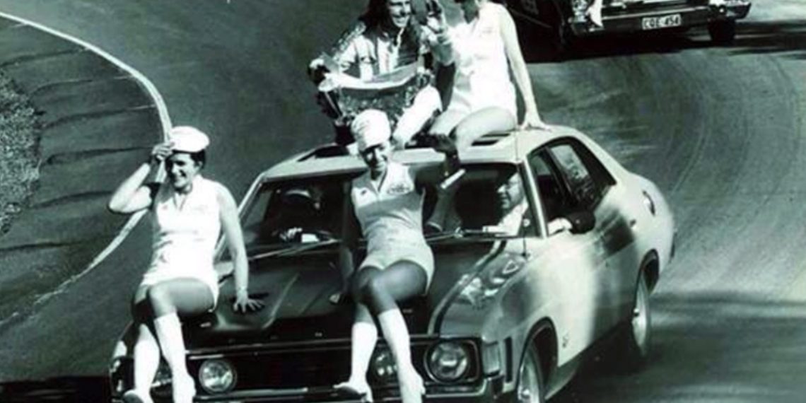 Bob Skelton taking a victory lap with TAA hostesses after he wrapped up the 1972 Driver To Europe Series.