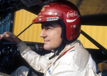 Bobby Allison gets set to race wearing his Coca-Cola helmet before the Winston Western 500 race on January 23, 1972 at the Riverside International Raceway.