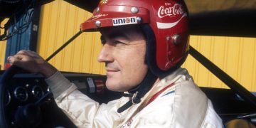 Bobby Allison gets set to race wearing his Coca-Cola helmet before the Winston Western 500 race on January 23, 1972 at the Riverside International Raceway.