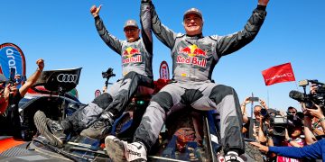 Carlos Sainz (right of shot) and navigator Lucas Cruz are the 2024 Dakar Rally champions. Image: Team Audi Sport Twitter