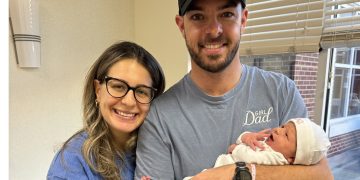 Scott McLaughlin and wife Karly with their new-born baby Lucy.