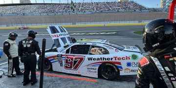 Shane van Gisbergen's #97 Chevrolet Camaro parked in pit lane with engine issues as Las Vegas Motor Speedway.