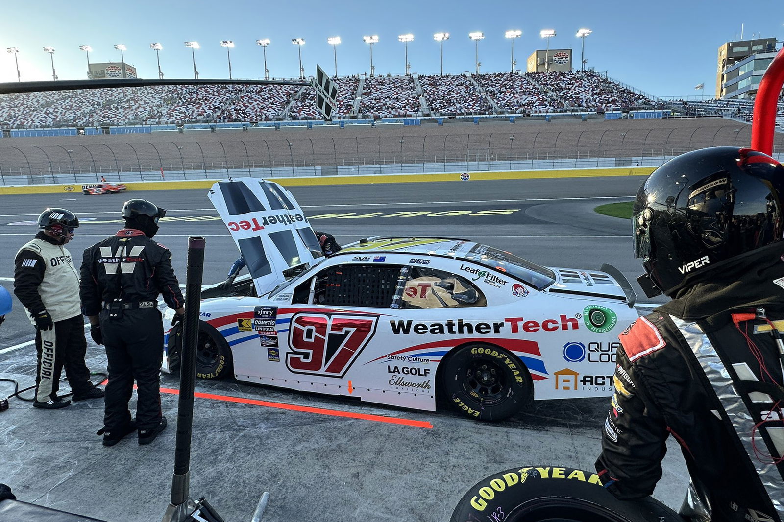 Shane van Gisbergen's #97 Chevrolet Camaro parked in pit lane with engine issues as Las Vegas Motor Speedway.